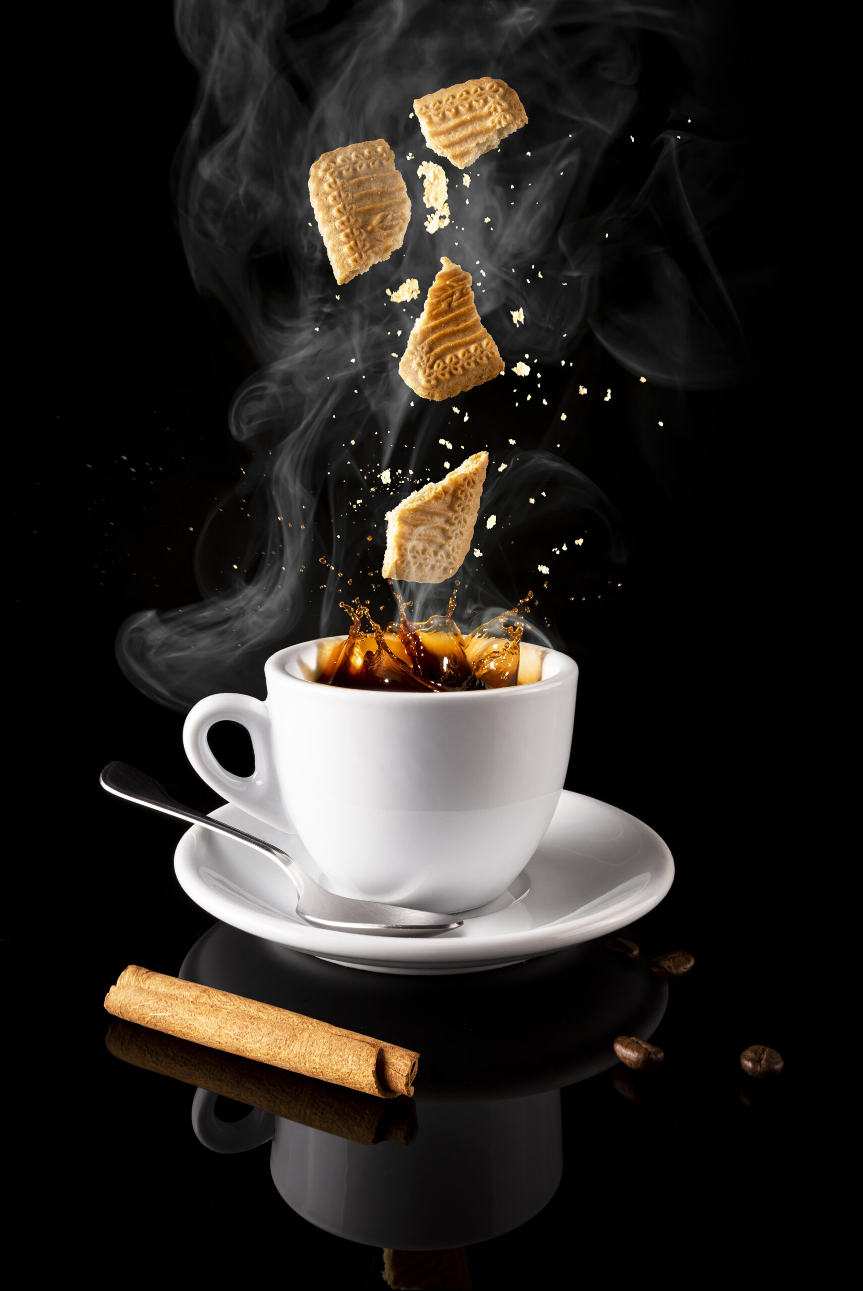 A vertical shot of hot coffee with waffles